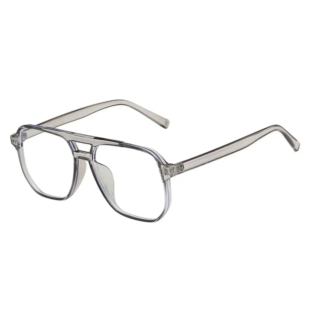 1 unidad de gafas modernas con filtro de luz azul, nuevas, para hombre y mujer, con montura transparente para usar frente a pantallas de ordenador, estilo retro y forma cuadrada.